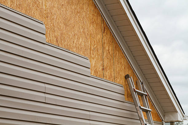 Professional Emergency Siding Repair technician working in Woodville, OH